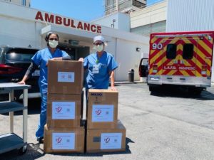 medical staff receive supplies from a medical courier service